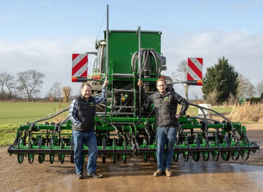 Fentech Agri directors and founders in front of a pneumatic Simtech drill